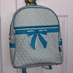 Book bag with bow and cute pockets.